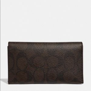 Coach Men's Universal Phone Case can be used as a wallet